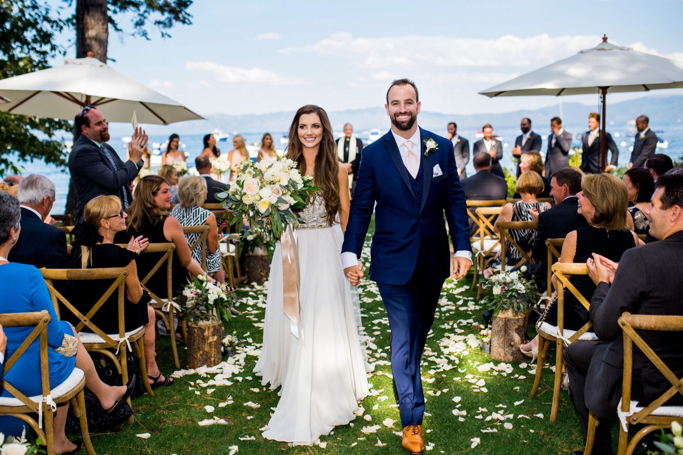 top tahoe wedding venue west shore inn with couple walking down isle